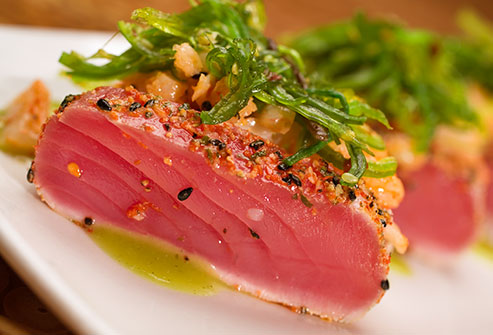 getty_rf_photo_of_seared_salmon_on_salad