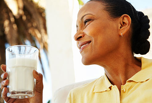 getty_rf_photo_of_woman_drinking_milk